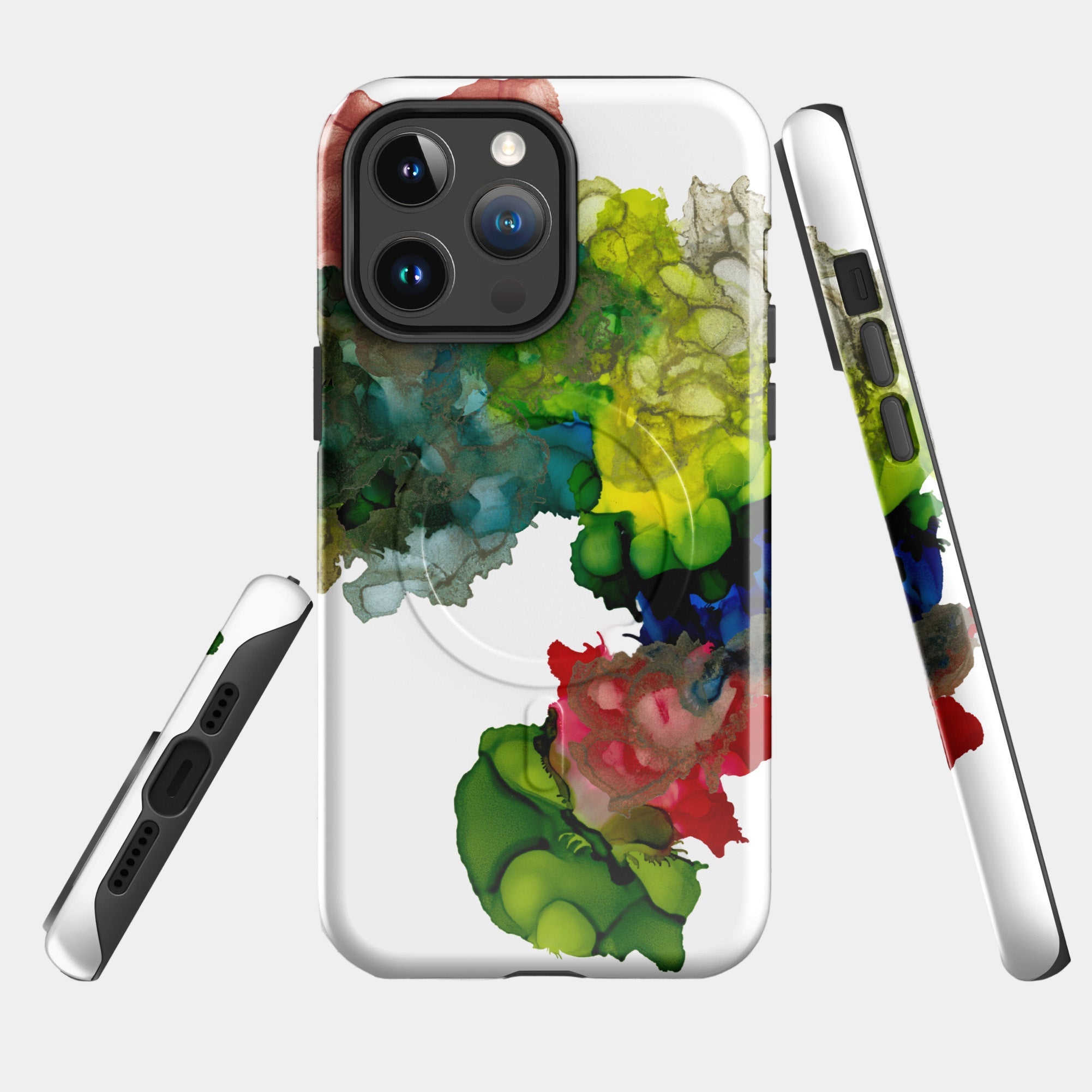 Phone case with colorful abstract design on a gray surface
